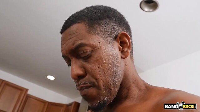 Black stepdad bare chested in kitchen, Sky comfort embrace