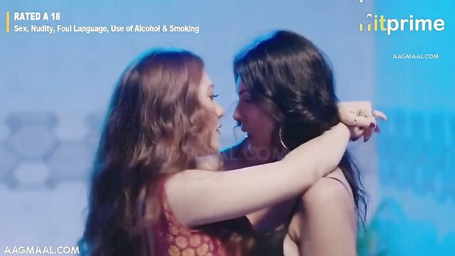 Two sexy Indian babes in erotic embrace, lesbian tease