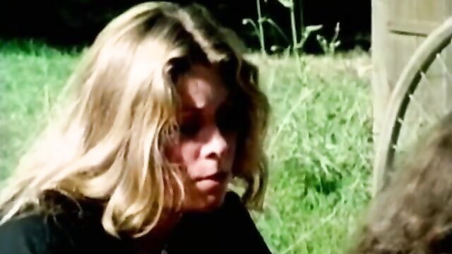 Blonde retro babe in black top at outdoor lawn party O.Z. Films