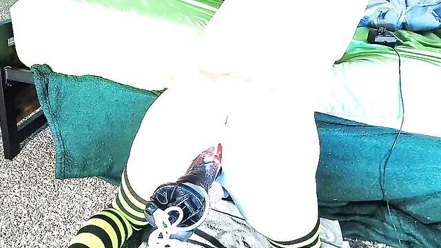 Amateur solo woman riding fucking machine with toys, legs spread wide