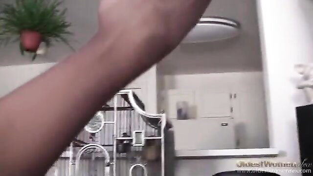 Big tits mature shoots naughty solo video in bathroom