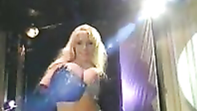 Blonde bombshell in sexy denim shorts at BOOBSVille Cabaret cabaret show
