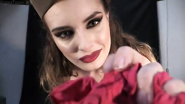 Portia Volkova in brainwash femdom with red roses and military hat