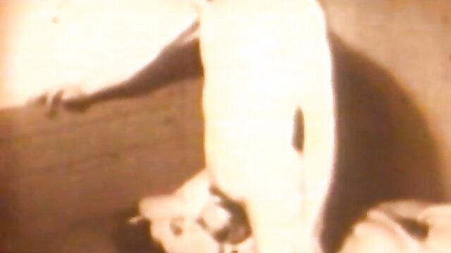 Vintage 1920-50s XXX thumbnail: pale woman in white dress bent over, retro erotic pose