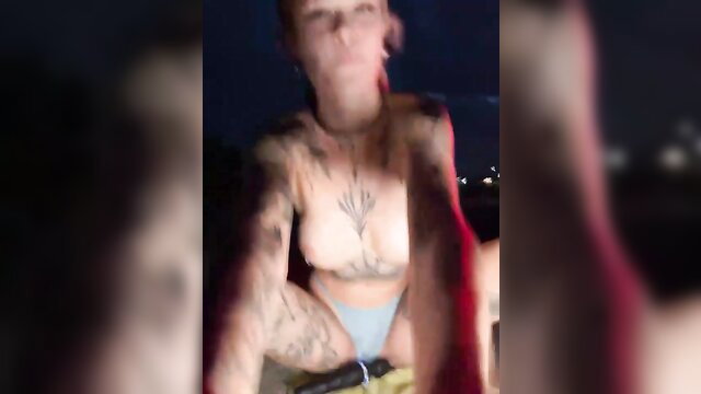Tattooed German teen masturbates topless on road at night