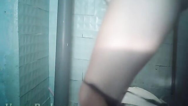 White slender amateur chick in black panties in toilet