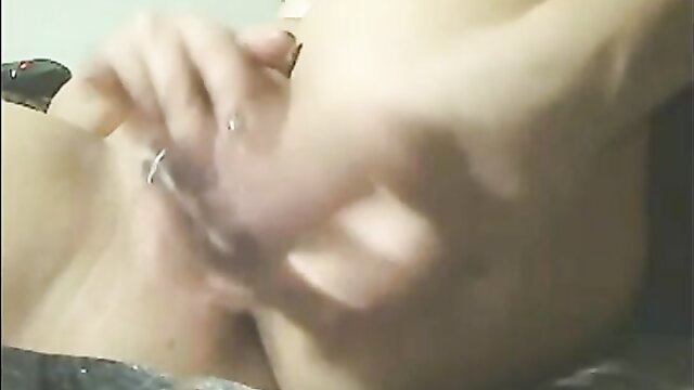 Busty white bimbo closeup hand on huge pale tits solo tease