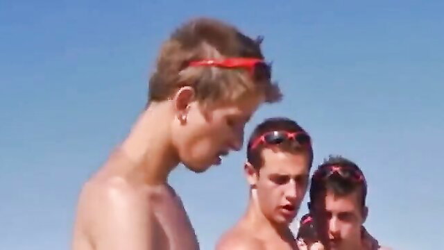 Three cute young white guys nude outdoors, beach twink threesome