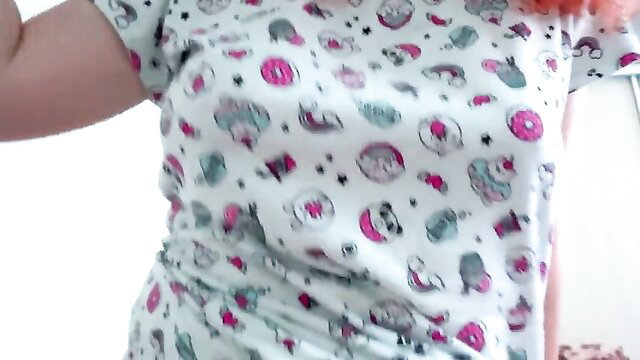Cute stepdaughter in unicorn donut PJs, teasing cleavage closeup