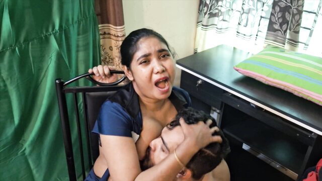 Indian Bhabhi grabs man's head to her big tits in taboo fuck