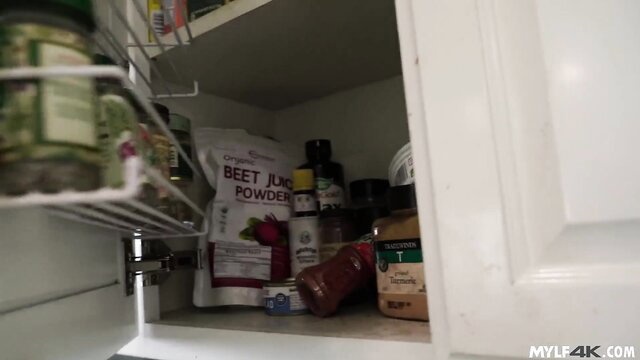 Joclyn Stone's kitchen cabinet with spices and beet powder