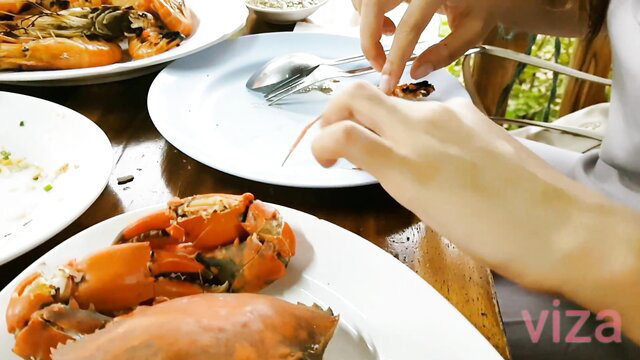 Thai girl big boobs eating crab in restaurant before fucking
