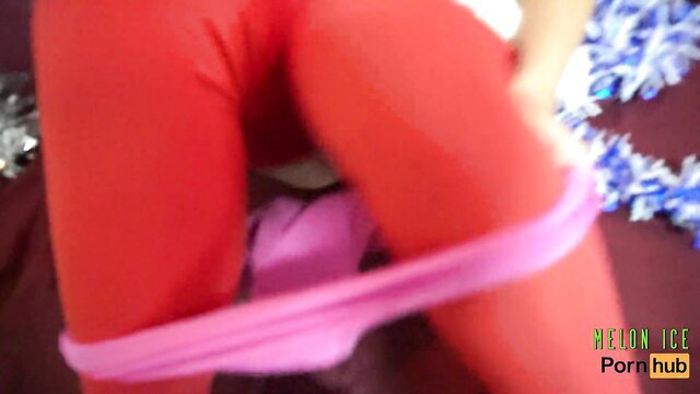 Melon Ice cheerleader in red shiny leggings pulls pink panties aside