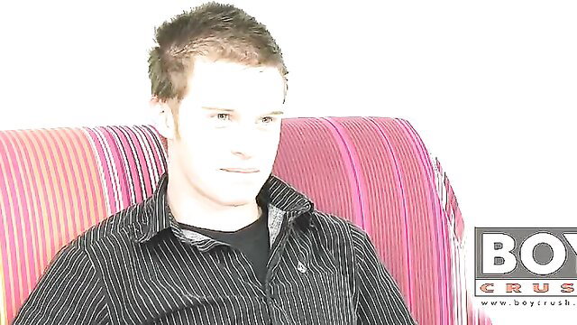 Kevin Grey in BoyCrush promo, young twink sitting clothed