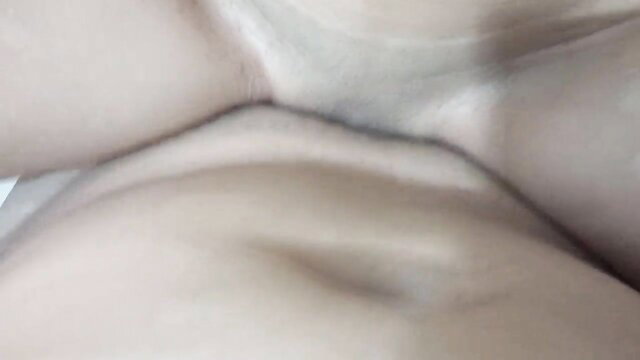 Closeup of woman's soaked shaved pussy spread in shower