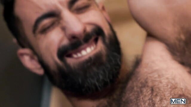 Bearded Daddy John smiles in closeup gay porn thumbnail
