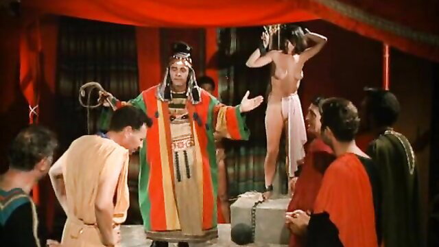 Vintage 1970 Cleopatra porn: nude bound blonde sacrificed in ritual orgy