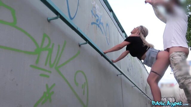 Carmel Anderson blonde bent over public railing by agent