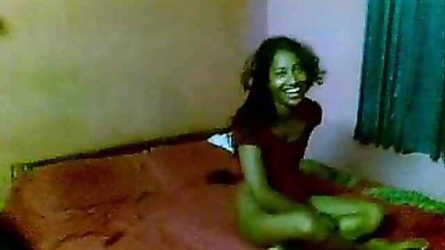 Smiling exotic Bangladeshi Deshi couple girl sitting nude on bed