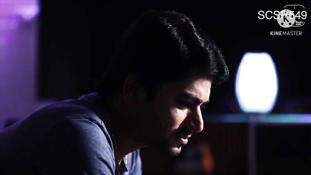 Handsome Indian man in dim light, intense gaze, Desi adult video thumbnail