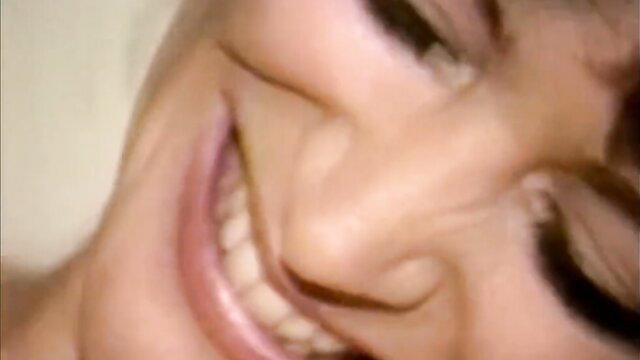 Smiling brunette closeup in Bobby’s Breast Workx porn classic