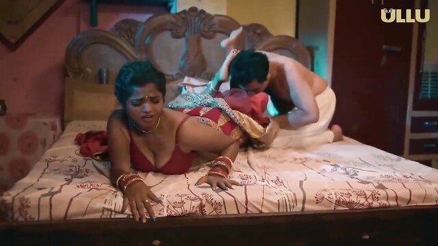 Indian MILF in red saree fucked doggystyle by lover on bed