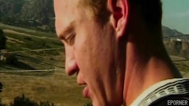 Closeup of redhead man's aroused face turning head in outdoor sex scene