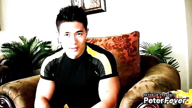 Hot Asian star athlete Peter Le flexing muscles in tight gym shirt
