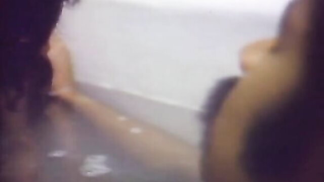 Vintage 1976 bath scene: black woman nude in tub, explicit oral sex