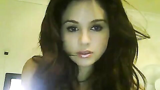 Stunning 18yo brunette babe with hot lips and sultry eyes on webcam