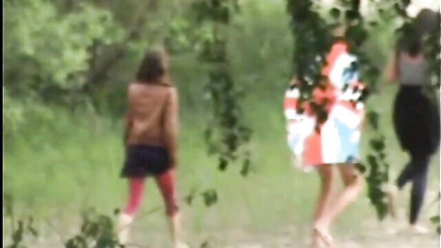 Stunning beach babes in colorful outfits walking outdoors, peeing fetish