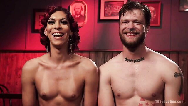 Redhead shemale and bearded guy nude smiling in hot domination preview