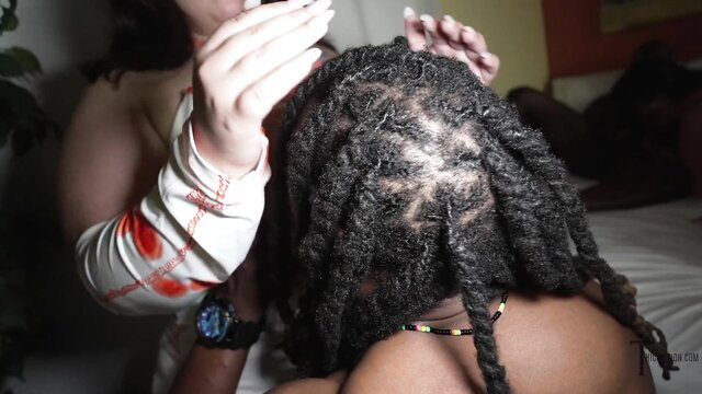 Curvy white babe groping dreadlocked black man's head in orgy