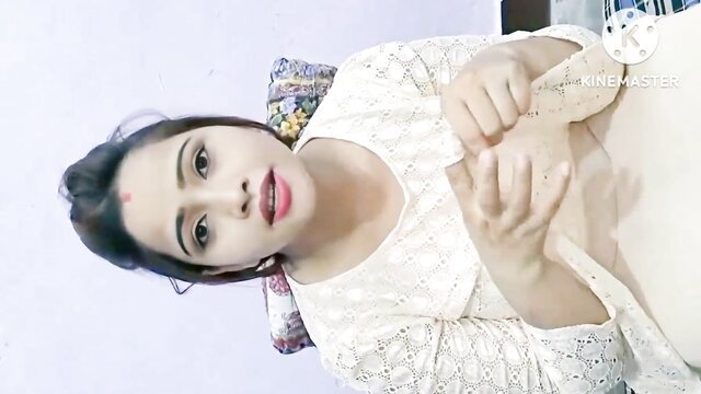 Indian beauty in lace top gestures seductively, massive cleavage tease