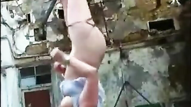 Kinky amateur slave tied up outdoors, tortured with high heels