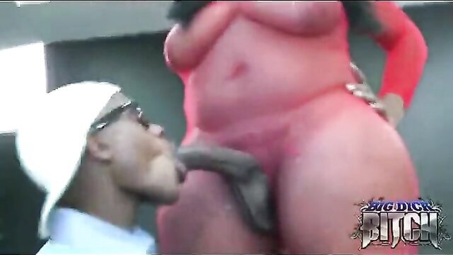 Shemale with big tits feeds black guy's BBC in stockings