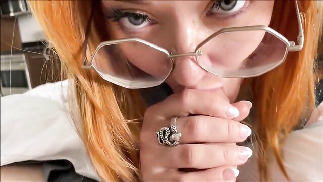 Redhead Emma Magnolia in glasses fingers mouth teasing POV