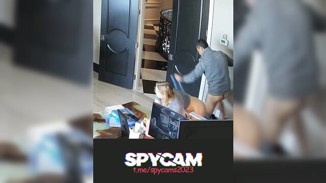 Spy cam catches Asian couple fucking doggy on office desk