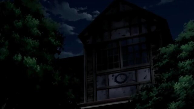 Dark night view of rundown wooden house with ominous window glow