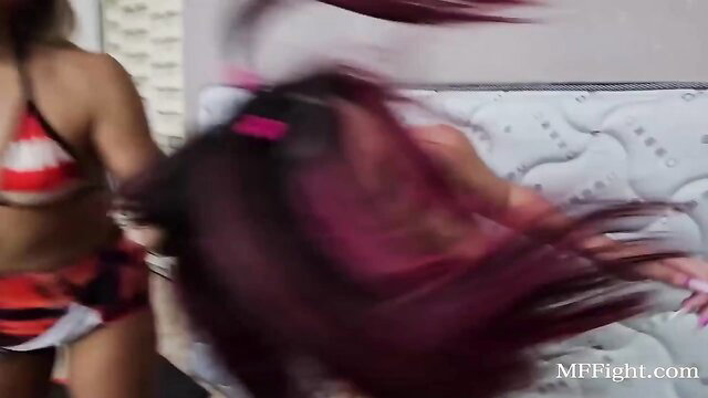 Brunette wrestler yanks hair, dominates rival in red bikini on bed