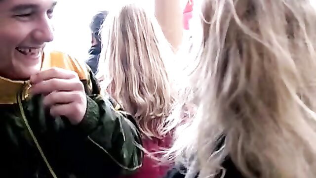 Young blonde teen in public crowd with smiling guy at McDonald's street fuck