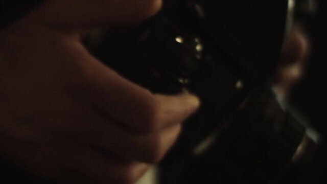 Sofi Ryan's hand stroking hard cock closeup in sultry light