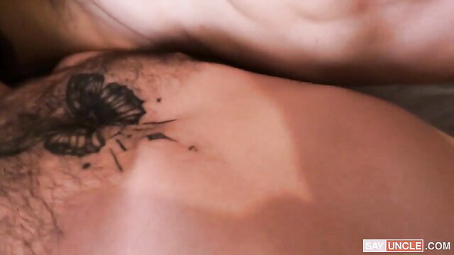 El Aleman and Caetano Soares bare torsos with tattoos in jeans hookup