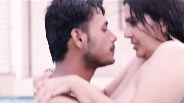 Steamy Indian MILF wet nude embrace with handsome guy in pool