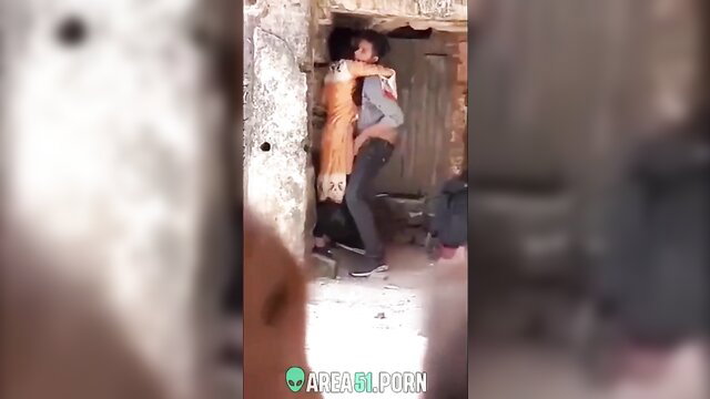 Indian woman being grabbed by a man