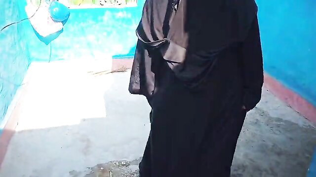 Stunning hijab babe in black niqab outdoors, naughty humiliation tease