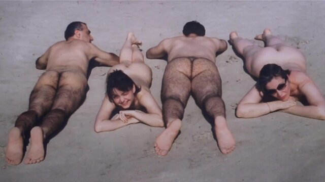 Dorina Chiriac nude beach group with hairy men butts exposed