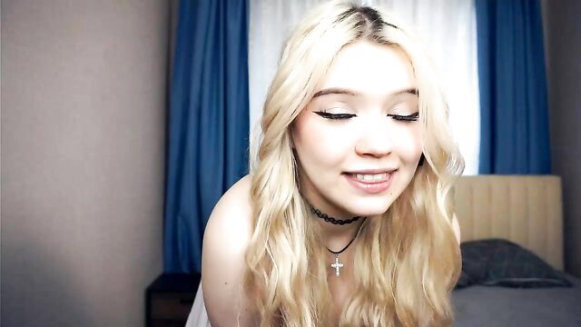 Jettahartill shy 18yo blonde smiles topless on bed