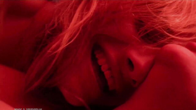 Angela Rios screaming in ecstasy with red hair in wild outdoor sex