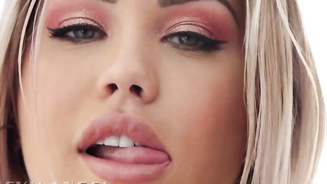 Alina Lopez teases with pink glossy lips and sultry eyes closeup